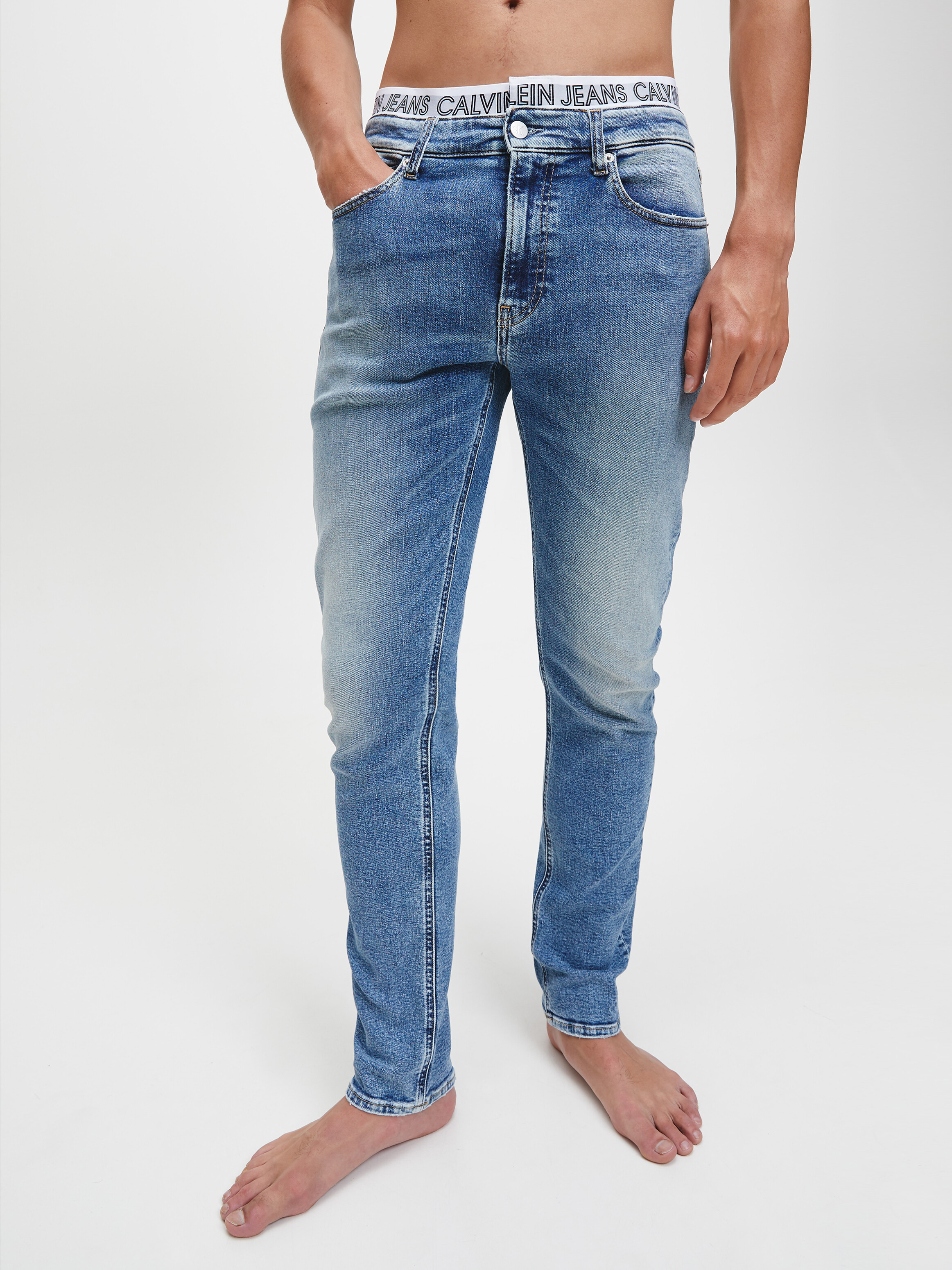 Logo Waistband Slim Tapered Jeans | Jeans | Calvin Klein Logo Waistband Slim Tapered Jeans | Jeans | Calvin Klein