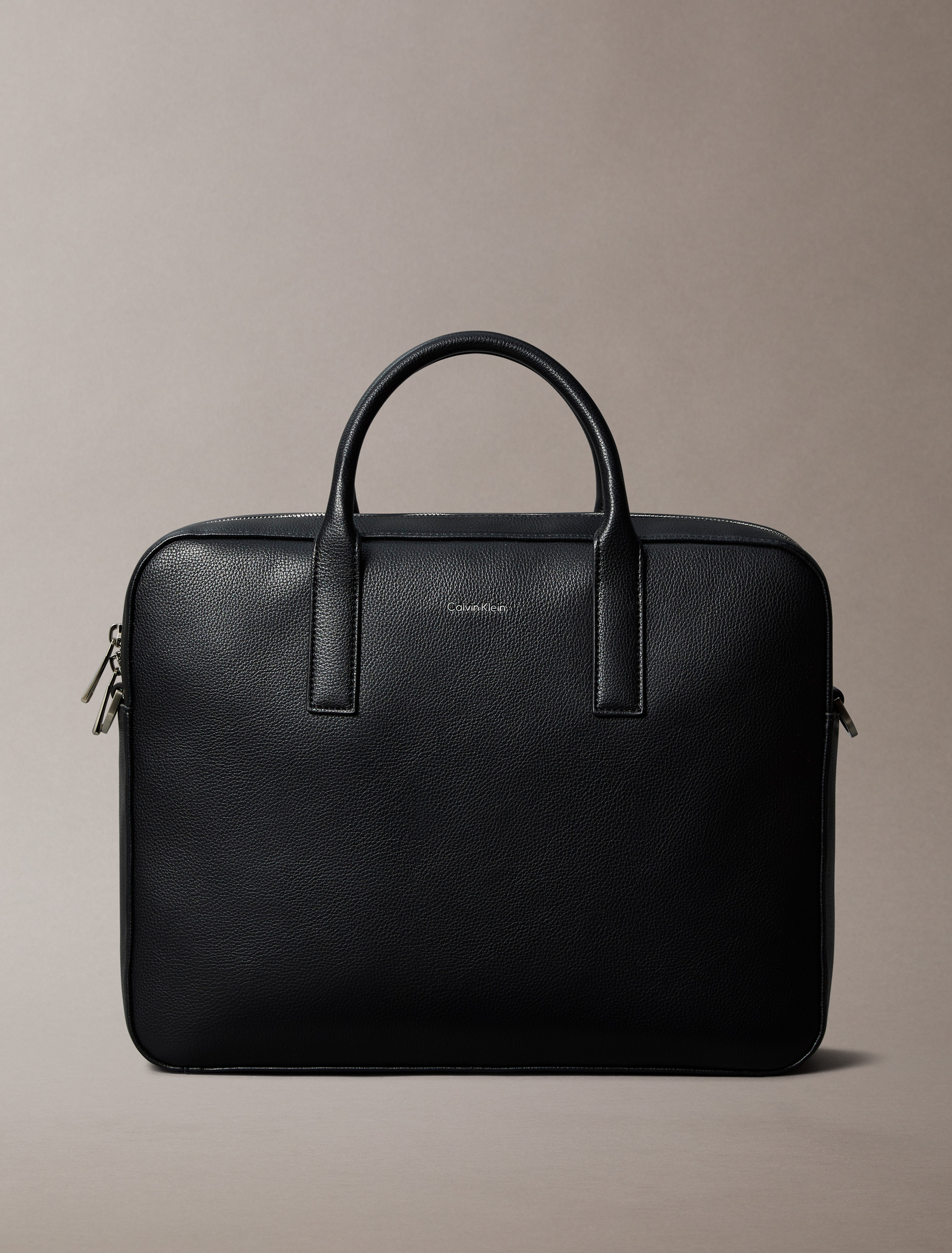 Raised Logo Commuter Bag
