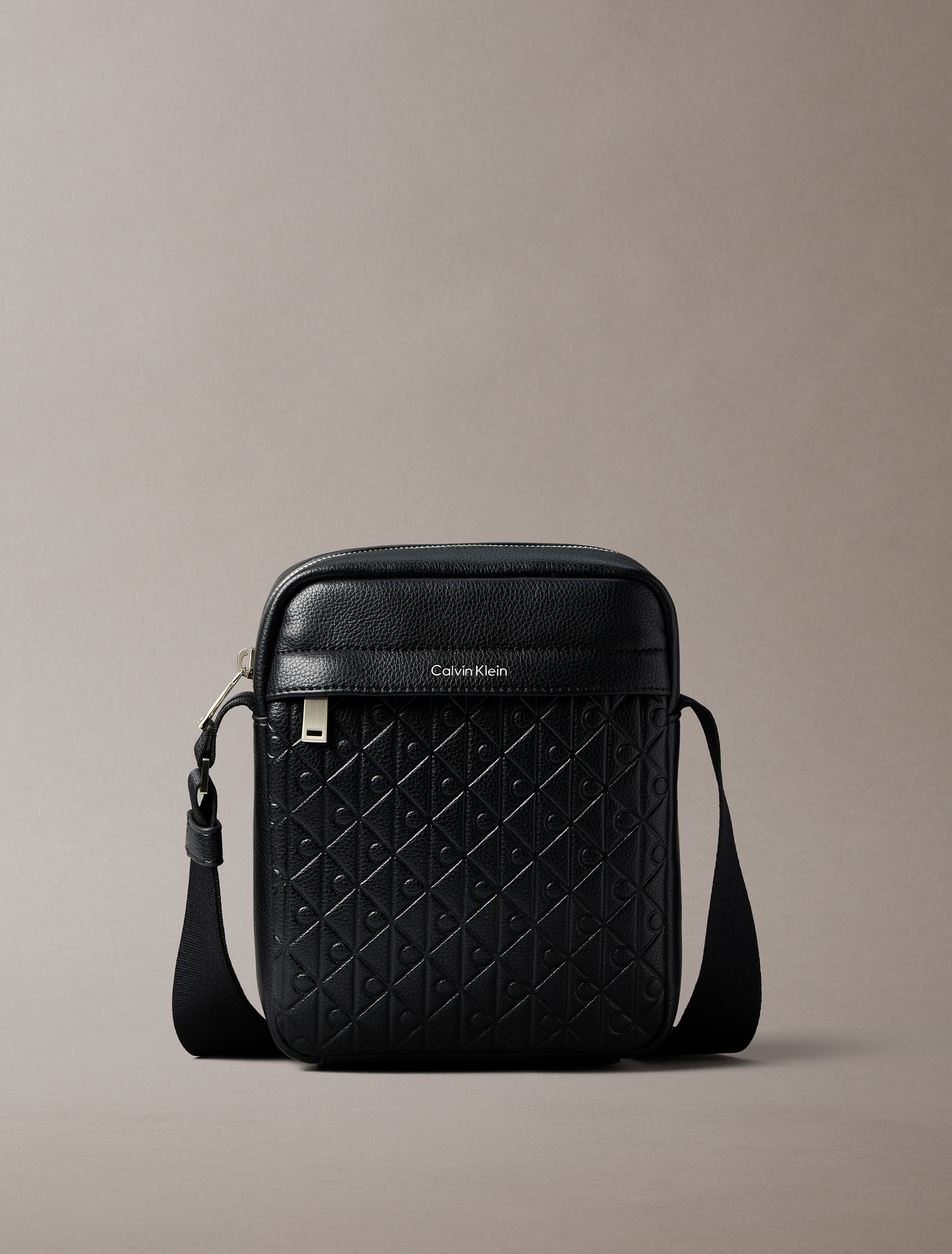 Embossed Allover Monogram Reporter Bag