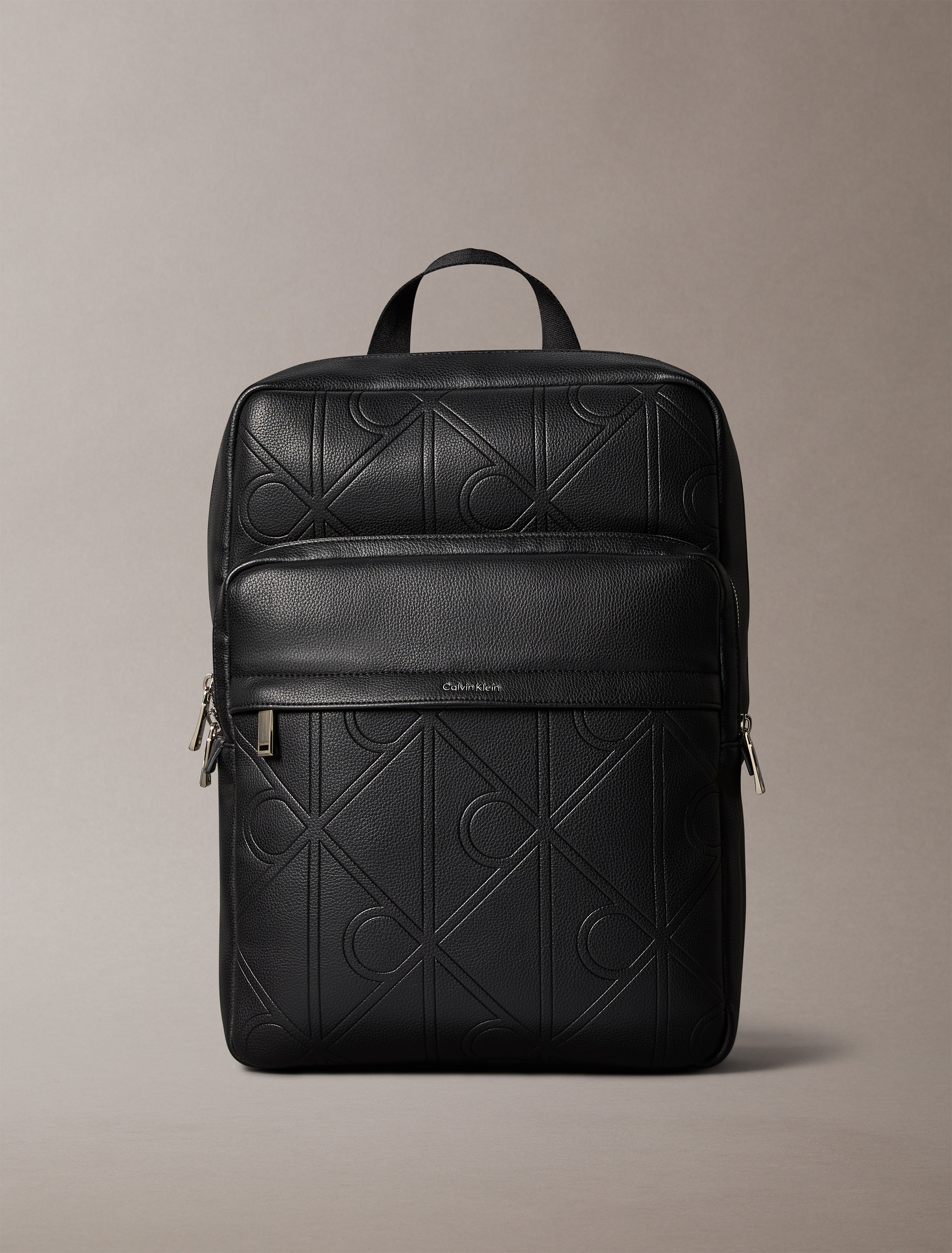 Allover Embossed Emblem Logo Round Backpack