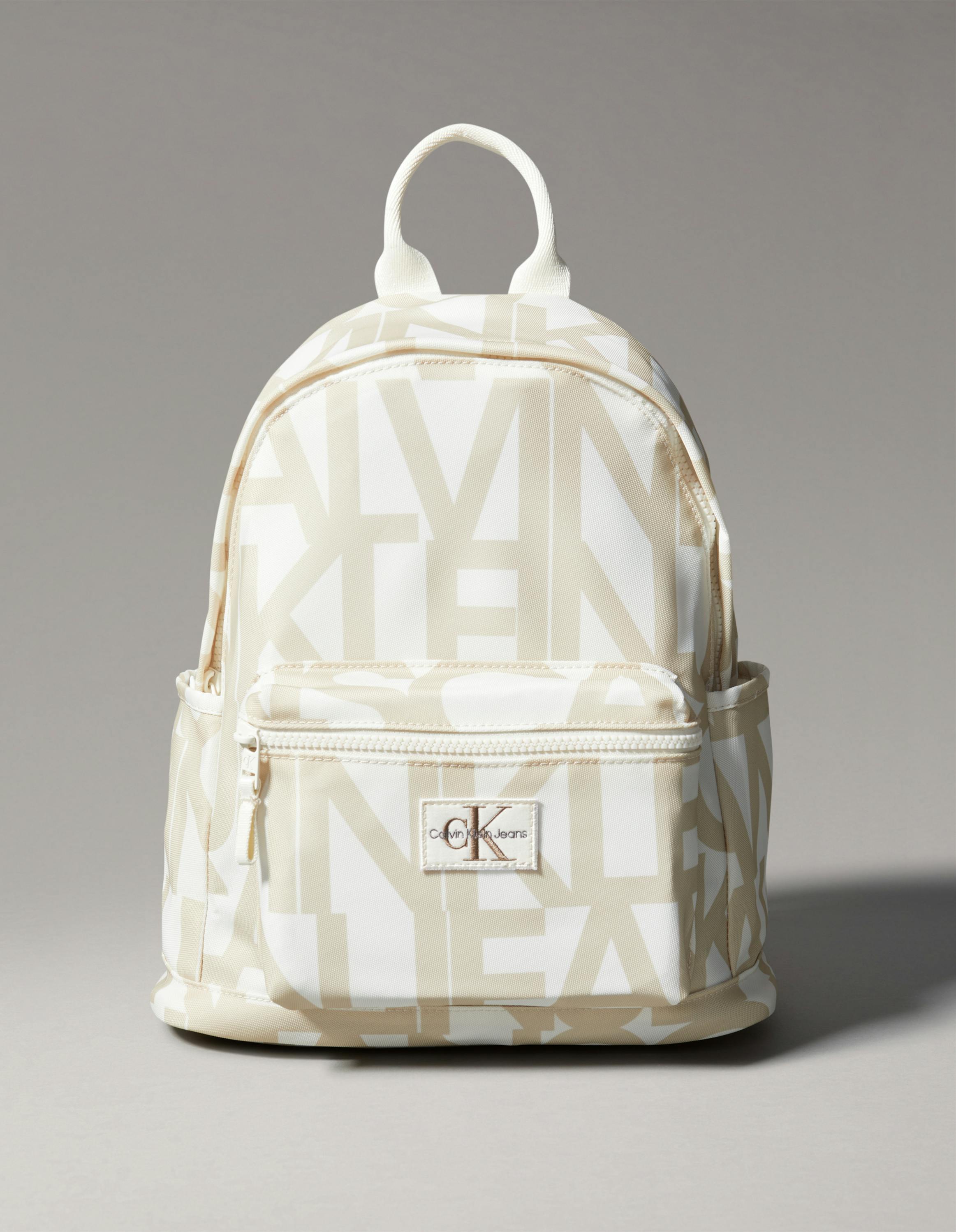 Calvin Klein Cream and Tan Logo-Print Backpack Amazon.com: Calvin Klein Reyna Signature Key Item Flap  main image 4