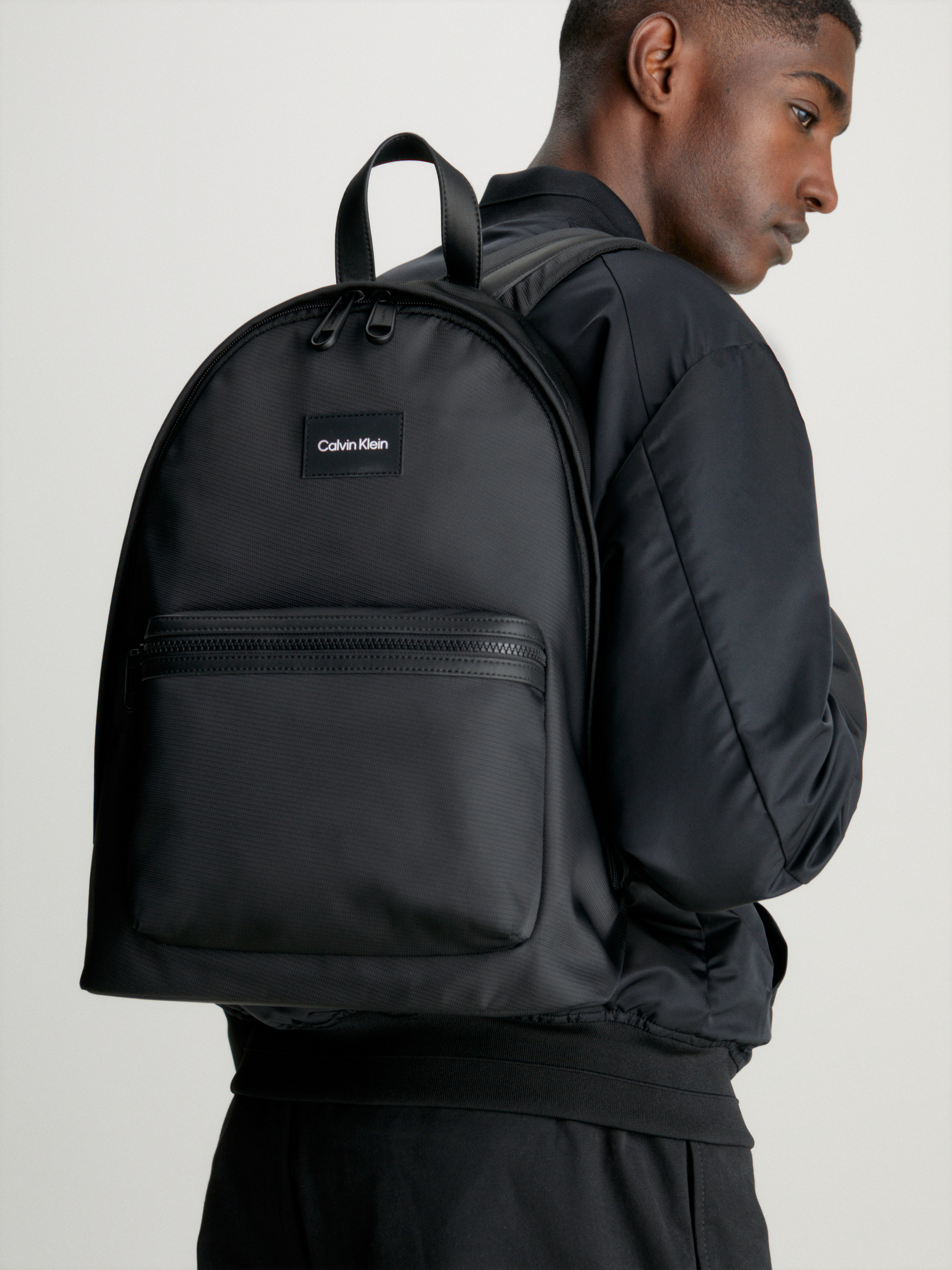 バックパック・リュック   Unisex CKJ AOP Campus Round Backpack 5MM174 Calvin Klein Unisex CKJ AOP Campus Round Backpack 5MM174